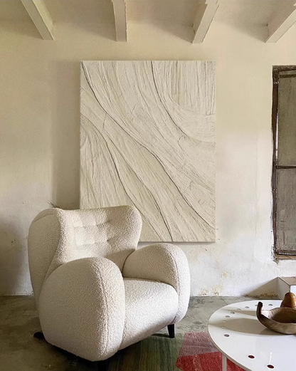Abstract beige painting with flowing, textured patterns resembling sand or stone formations.